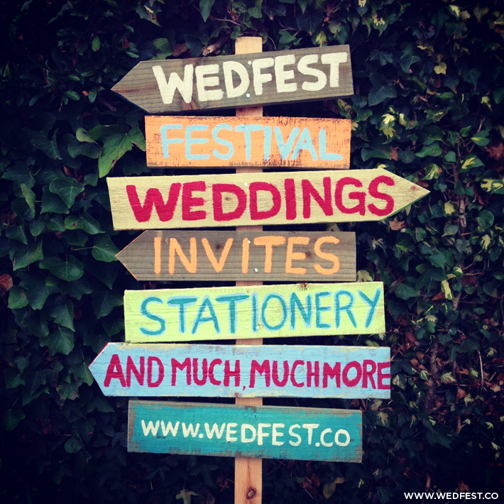 festival wedding vintage wooden signpost