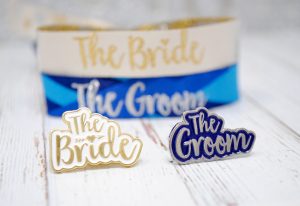 bride and groom badges and wristbands