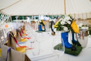 festival weddings table decorations flowers wellies