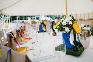 festival weddings table decorations flowers wellies