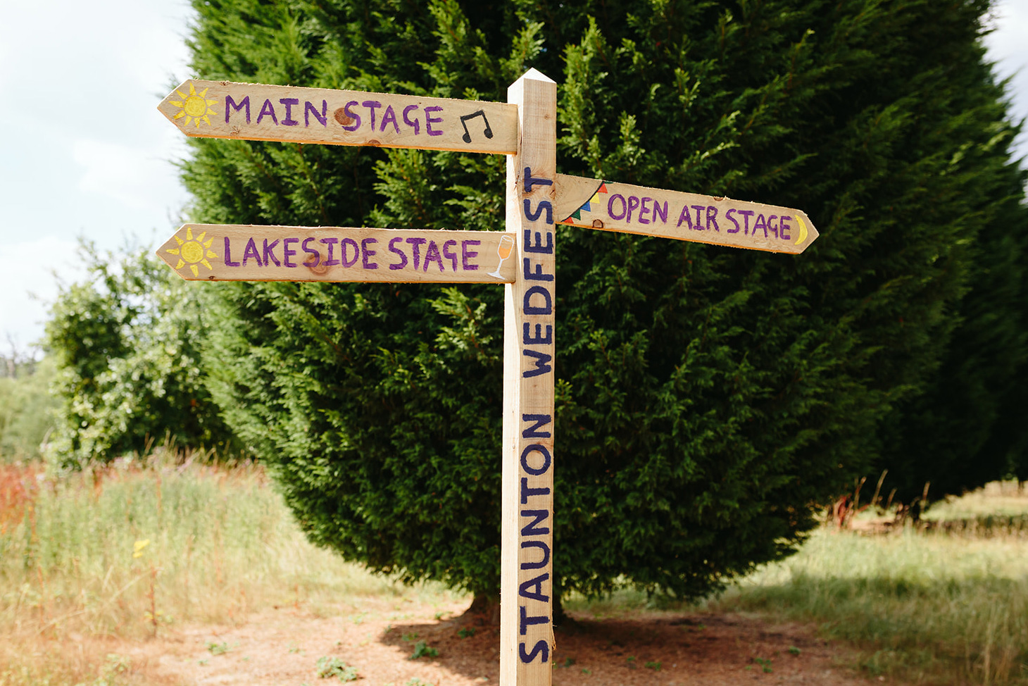 festival weddings wedfest wooden signage