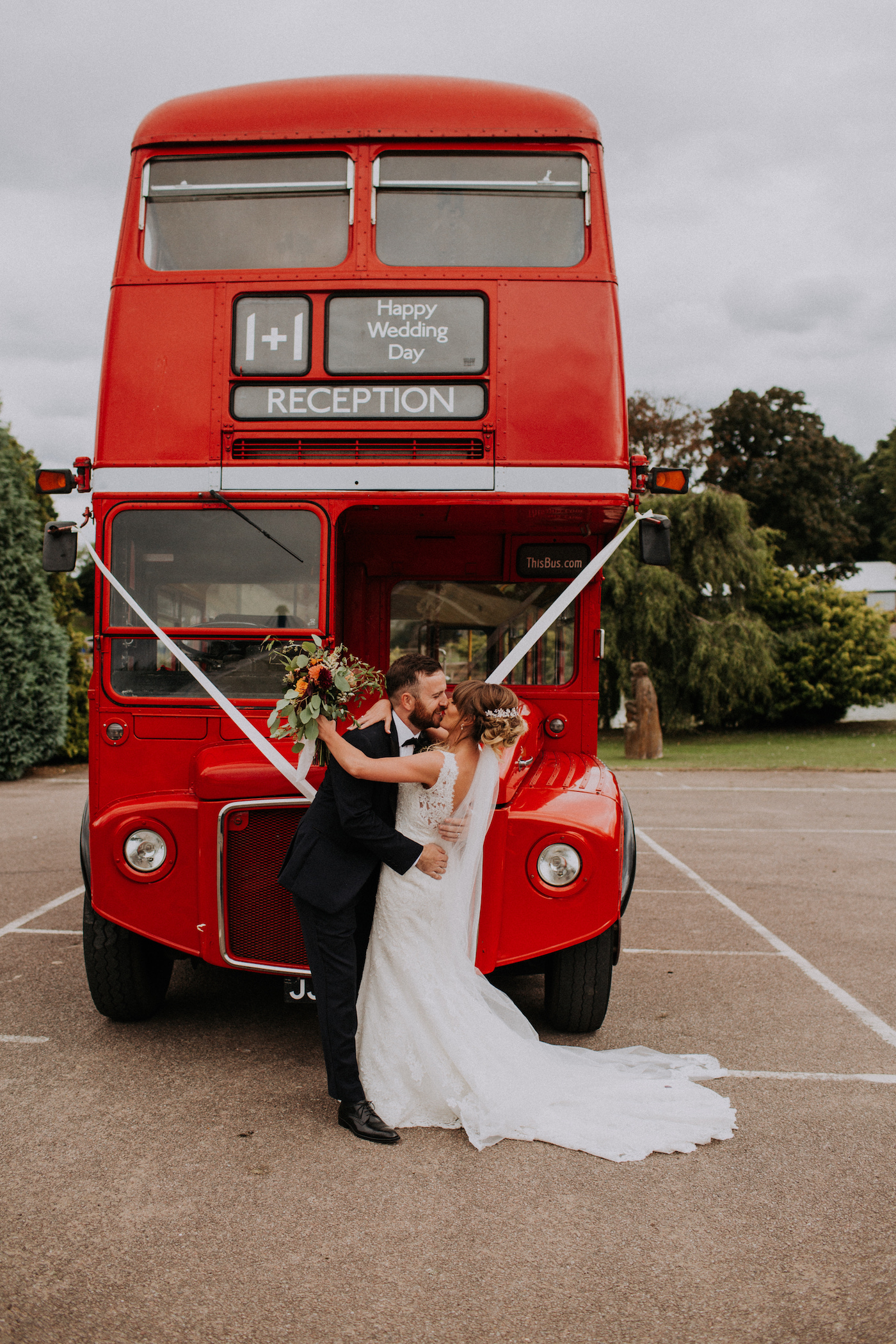 festival wedding red double decker bus