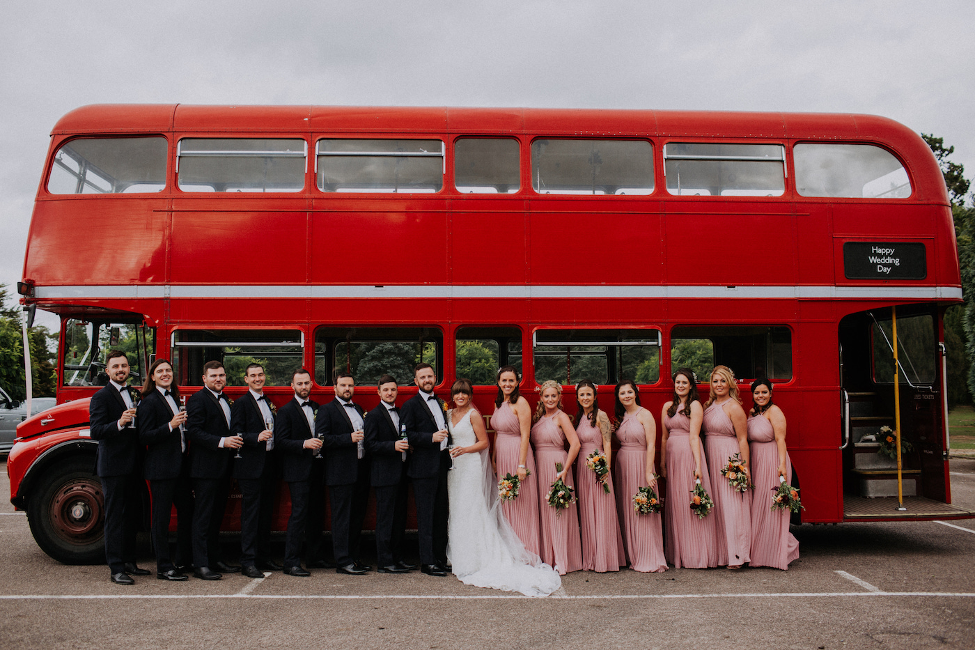 glastonbury festival wedding red double decker bus