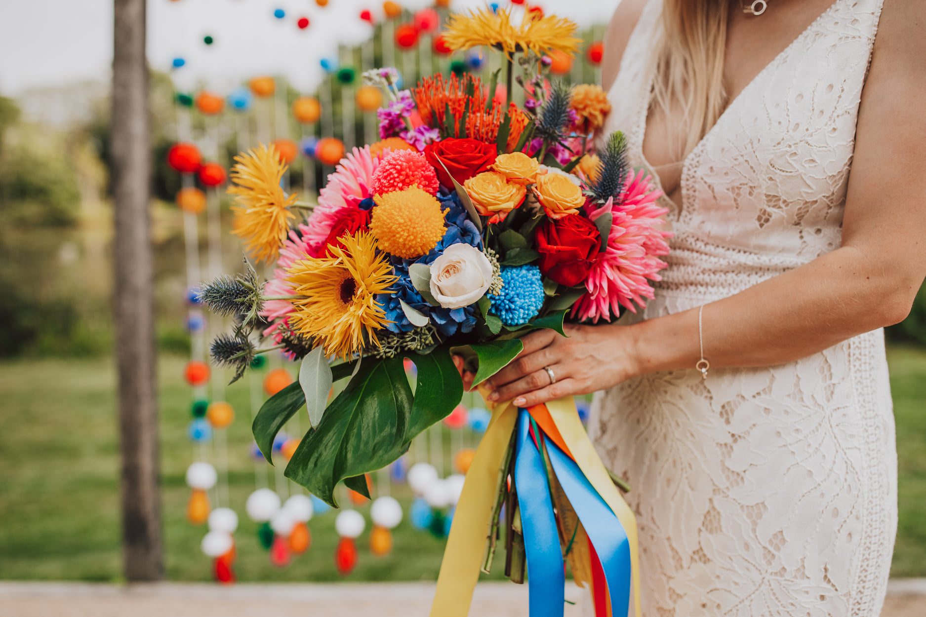 festival wedding colourful brides flowers